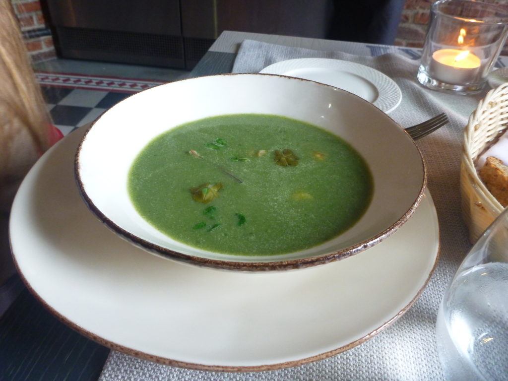 A tourist chose the stinging nettle and spinach soup with crayfish.